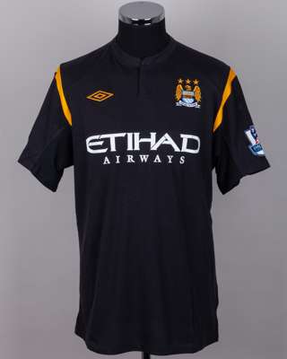 Kolo Toure black and yellow No28 Manchester City match worn short-sleeved shirt, 2010