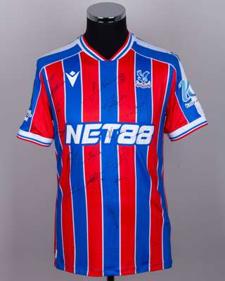 Red and blue Crystal Palace v. AEK Larnaca match issued squad signed shirt