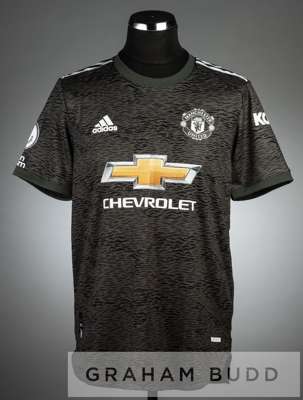Luke Shaw black and grey Manchester United 23 away jersey, season 2020-21,
 short-sleeved PREMIER LEAGUE and NO ROOM FOR RACISM sleeve badges, club cr