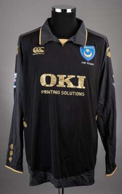 Linvoy Primus black No.2  Portsmouth home jersey
 the item is a long sleeved example with the Barclays Premiership badge on both. The front has the Po
