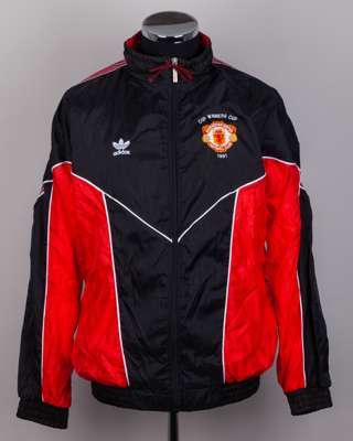 Mark Hughes a black and red Manchester United Cup Winners Cup tracksuit top, 1991