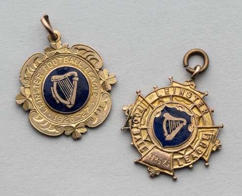 Two 9ct gold and enamel Irish football medals won by Bendigo AFC in the Leinster Football League 1920s,
 the first dated 1925-26, the second dated 192