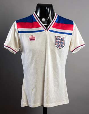 Phil Neal white No.14 England 1982 World Cup jersey, bench-worn, short-sleeved  This jersey was from the group match v Czechoslovakia. Phil Neal was a