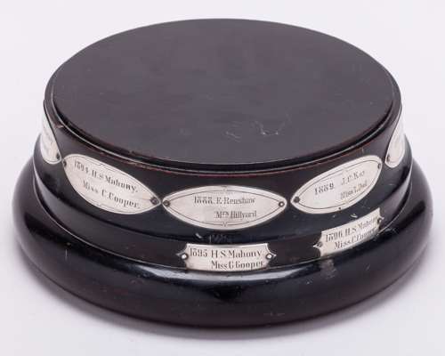A turned ebony trophy base The All England Mixed Doubles