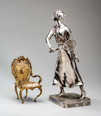 Kayzerzinn silvered lady Lawn Tennis player, early 20th century,  

modelled standing with a racquet upon a canted plinth base signed W. Zwick, with f