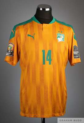 Simon Deli yellow and green No.14 Ivory Coast short-sleeved shirt, 2021, 
 Puma, L, with button-up collar and printed badge, the reverse lettered S. D