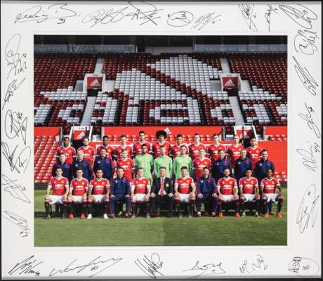 2015 Manchester United team line-up, manager and backroom staff fully signed photograph, 
 the autographs around the margin, 28 by 32in.. framed and g