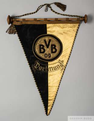 Official orange and black Borussia Dortmund friendly match pennant, 1951
 of triangular design, inscribed BVB 09, Dortmund, hanging bar and tassels

P