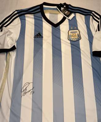 Argentina: Cristian Romero signed Argentina home shirt,
 Played in 2022 winning World Cup in Qatar. Signed on the front left hand side with black shar