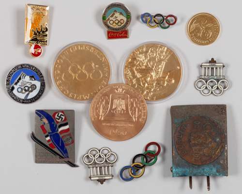 Two 1936 Berlin Olympic enamel lapel badges, formed as the Brandenburg Gate