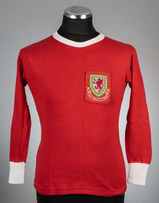 Red Wales no.7 home jersey, season 1966-67,
 long-sleeved with stitched on embroidered national emblem badge patch, reverse numbered 11, white collar 