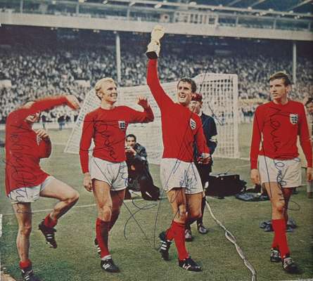 England 1966 World Cup Winners Nobby Stiles, Bobby Moore, Geoff Hurst and Martin Peters signed, 
 all four have each hand signed in the same blue biro