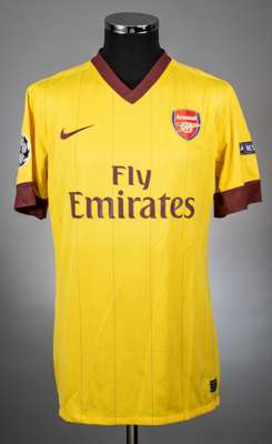 Tomas Rosicky yellow Arsenal no. 7 away jersey from the 2010-11 season Champions League game v Barcelona on 8/3/11 at the Nou Camp,
 Player issued sho