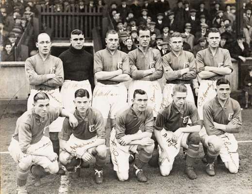 Leeds United season 1935-36 original team b&w signed photograph,
 8.5 by 7/5 in., of team in front of stand and crown, fully signed in black ink to wh