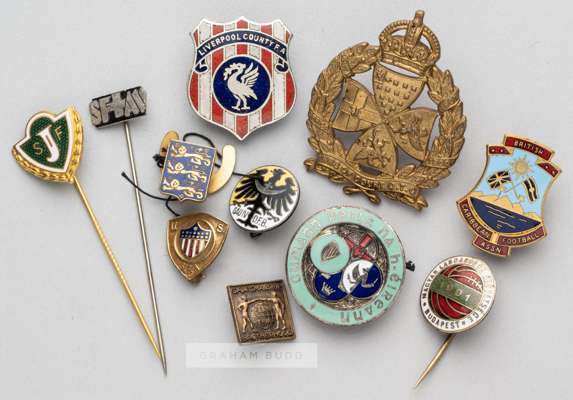 Eleven miscellaneous badges awarded to the Football Association official H.H. Hughes, 
 including one bearing the FA crest, another the Austrian FA cr
