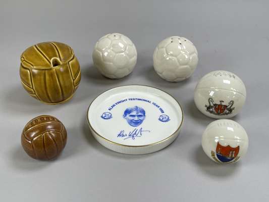 Six various ceramic footballs including cruet set and Crested wear example and an Alan Knight testimonial plate