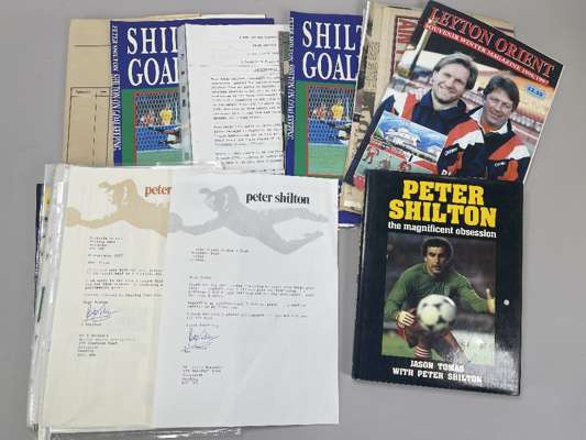 Large collection of items relating to Peter Shilton,
 includes books, FDC, photographs, programmes, postcards, editorials, many signed, note book Pete