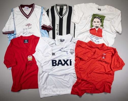 A group of six signed replica football jerseys,
 comprising a Tom Finney Preston North End circa 1999; a Ferenc Puskas Toffs Hungary v England 1953 re