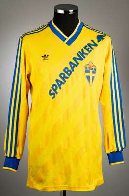 Yellow Sweden no.4 home jersey, circa 1989,
 Adidas, long-sleeved with national emblem, with Sparbanken logo, reverse numbered 4, size L, condition go