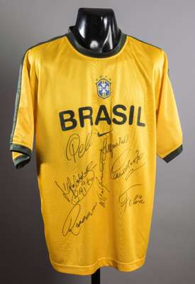 Replica 4-star Brazil jersey signed by seven members of the 1970 World Cup winning team, signed in black marker pen by Pele, Brito, Rivelino, Felix, P
