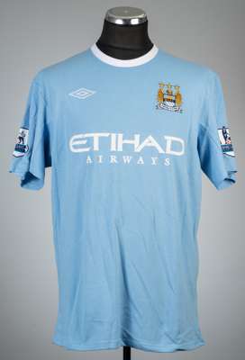 Vincent Kompany blue Manchester City no.33 home jersey, season 2009-10,
 Umbro, short-sleeved with BARCLAY PREMIER LEAGUE sleeve badges, club crest an
