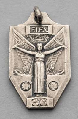 Silver-plated replica of a FIFA 1950 World Cup medal presented for the participation of Stan Mortensen of Blackpool FC,
 area of wear to plating along
