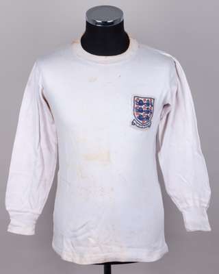 David Sadler white No.14 England Youth v. Spain long-sleeved shirt, 1964