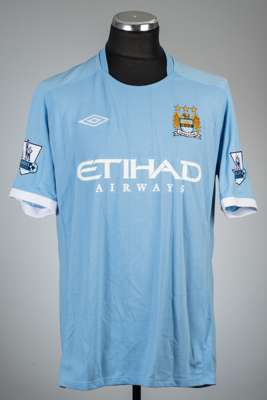 Yaya Toure blue Manchester City no.28 home jersey, season 2010-11,
 Umbro, short-sleeved with BARCLAY PREMIER LEAGUE sleeve badges, club crest and spo