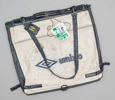 An England Football Association Italia '90 official suit carrier,
 with two accessories pockets and carry handle, in well used condition, an Italia '9