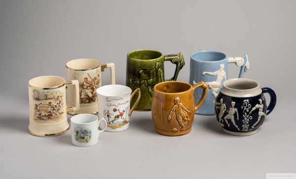 Group of six ceramic and pottery footballing tankards, 
 each featuring an embossed or printed footballers or match action, makers include Royal Imper