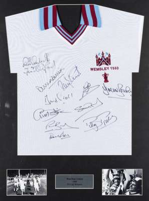 A retro football shirt signed by the West Ham United 1980 F.A. Cup winners, white West Ham Cup final replica jersey, signatures in black marker pen, D