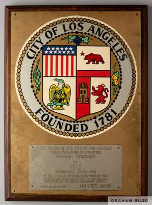 An "Honorary Citizen" plaque presented to Pelé in 1972, by the city of Los Angeles, California.
 The wood plaque features the seal of the city of Los 
