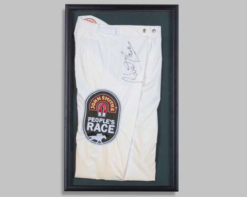 Breeches autographed by the 2007 Grand National winning jockey Robbie Power