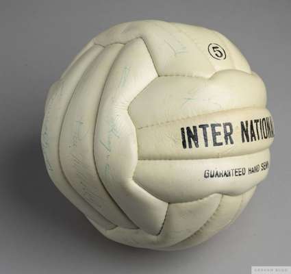 Inter National case ball bearing the signatures in pen of the Leeds United side of the 1974/5 season 
 including Billy Bremner, Gordon McQueen, Paul R