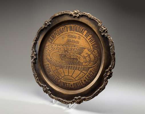 A large and heavy bronze salver presented to the football manager Walter Winterbottom when England topped Group VI in the qualification rounds for the