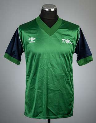 Green and navy Arsenal replica away jersey, season 1982-83,
 Umbro, short-sleeved with club crest and Umbro logo in felt, un-numbered, neck label remo