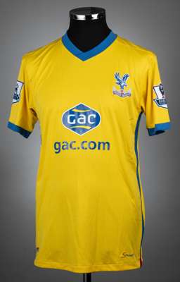 Dwight Gayle signed yellow & blue Crystal Palace no.16 third choice jersey, season 2013-14,
 match-issue, Avec, short-sleeved with BARCLAYS PREMIER LE
