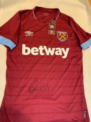 Andy Carroll signed claret and blue West Ham United replica home jersey 2018-19,
 Umbro, short-sleeved with club crest and sponsor logo, signed in mar