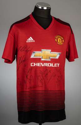 Squad signed red and black Manchester United replica shirt, season 2018-19,
 Adidas, short-sleeved with club crest and sponsor logo, signed in black m