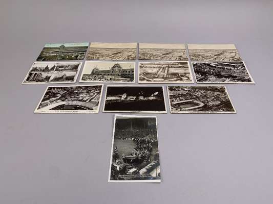 Eleven British Empire Exhibition postcards with views of Wembley, including Fleetway Press examples and a colour Stadium from Flip-Flap. The Great Whi