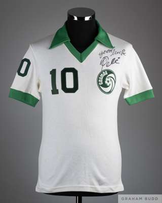 Pele white and green No.10 New York Cosmos v. Dallas Tornado short-sleeved shirt, 1976, 
 Umbro, M, with v-neck collar and printed Cosmos badge, the f