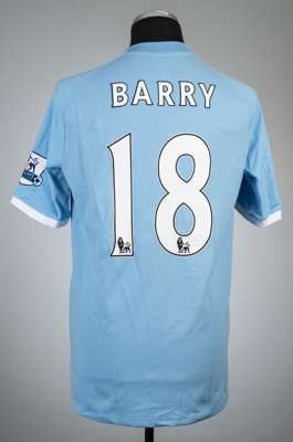 Gareth Barry blue Manchester City no.18 home jersey, season 2010-11,
 Umbro, short-sleeved with BARCLAYS PREMIER LEAGUE sleeve badges, club crest and 