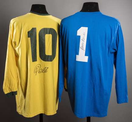 Signed Pele and Gordon Banks 1970 World Cup style jerseys, a yellow Brazil No10 and a blue England No.1 goalkeeper's jersey, Pele signed below the shi