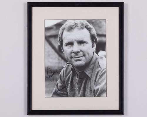 A Bobby Moore black and white autographed photograph