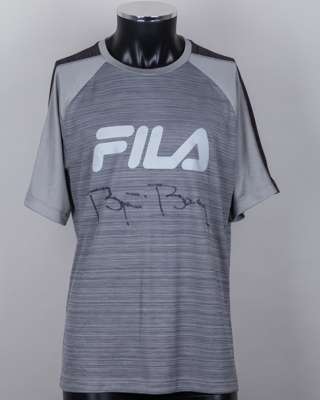 A grey Fila tennis shirt autographed by Bjorn Borg, UK XL, with crew-neck collar