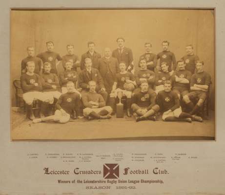 Pair of early b&w photographs of Leicester Crusaders RFC team, season 1891-92,
 the first a team photograph of players and officials with trophy cup, 