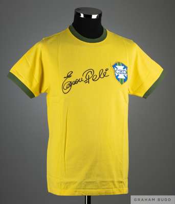 A replica Brazil shirt autographed by Pele
 with COA from Sporting Memorabilia.co.uk signed by Terry Baker