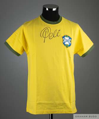 A replica Brazil shirt autographed by Pele
 with COA from Sporting Memorabilia.co.uk signed by Terry Baker