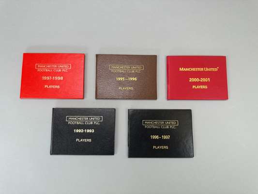 A group of four Manchester United player's tickets issued to John O'Kane,
 for seasons 1992-93, 1995-96, 1996-97 & 1997-98, in black, brown, black and