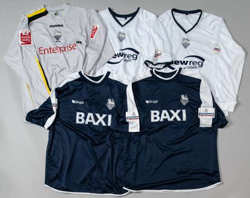 A group of five Preston North End Football League match jerseys,
 comprising Rob Edwards white no.15 home jersey; Lee Cartwright white no.7 home jerse
